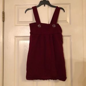 Maroon tank top with buttoned straps